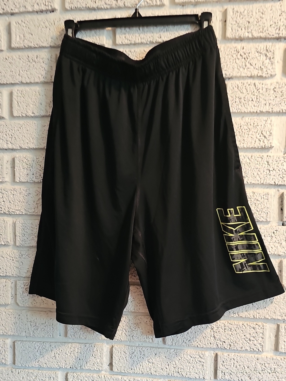 Nike Black Men’s Athletic Shorts with Yellow Outline Logo